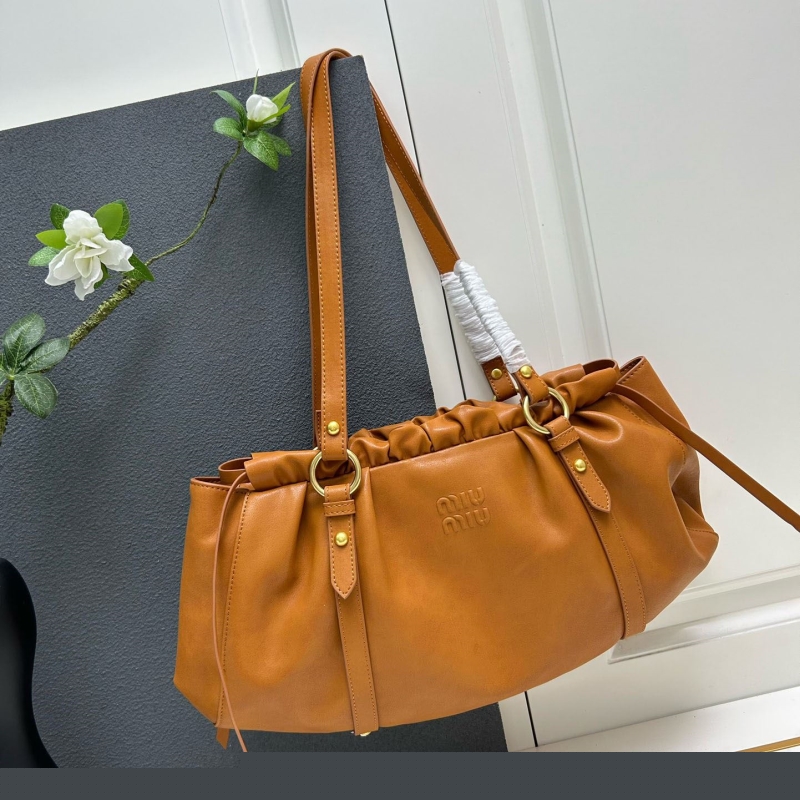 Pra*a top handle bags